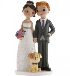 Brudpar till tårtan med hund