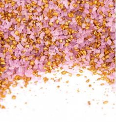 Strössel sockerkristaller rosa guld