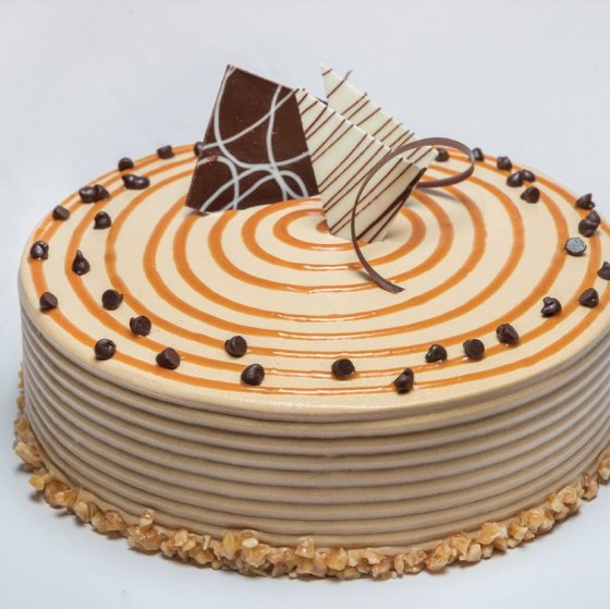 Eldrivet roterande tårtfat