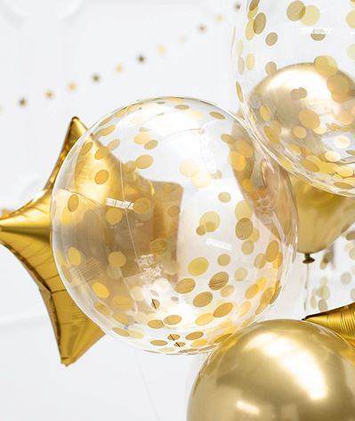 Stor ballong med guldprickar