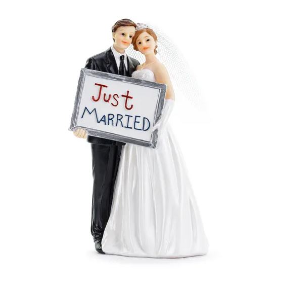 Brudpar till bröllopstårtan