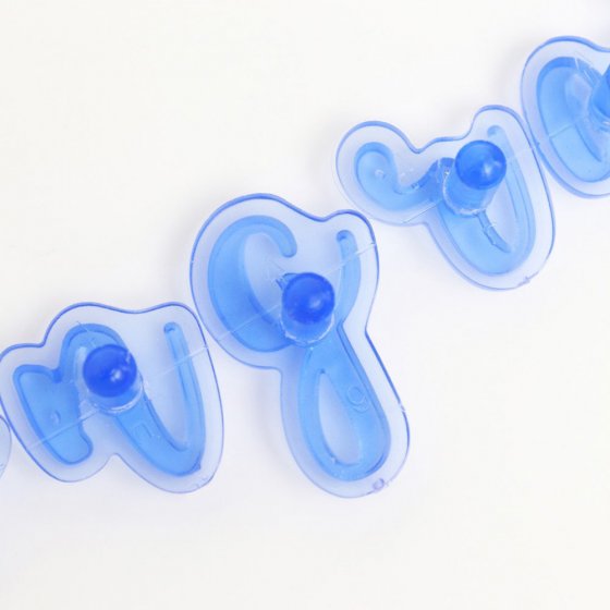 Bokstäver för prägling av tårta