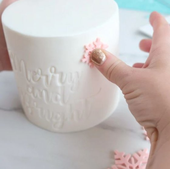 Outboss stämpel snöflingor