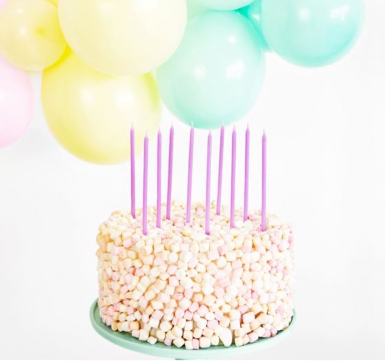 Höga tårtljus lila